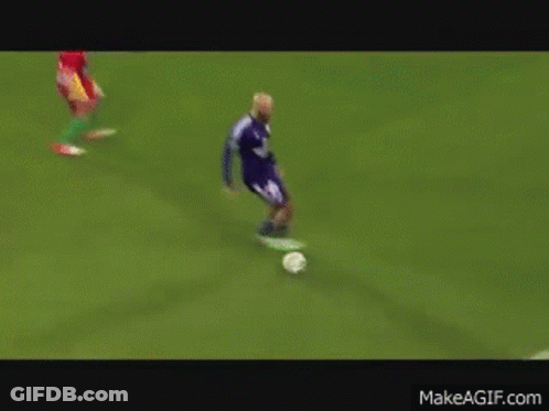 Soccer Game On Field With Electrobel Sign GIF
