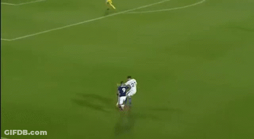 Soccer Game On Field With Palm Advertisements GIF