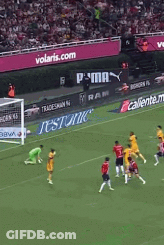 Soccer Game On Field With Volaris Sign GIF
