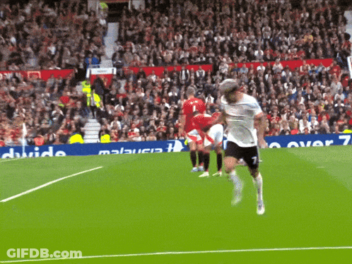 Soccer Game With Malaysia Ad In Background GIF
