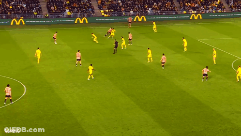 Soccer Game With Skechers And Reebok Ads GIF