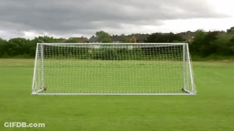 Soccer Goal In Field With Cloudy Sky GIF