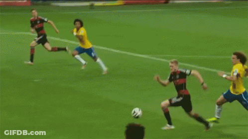 Soccer Goalie Jumping To Catch Ball With Yingli Solar Banner GIF