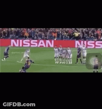 Soccer Goalkeeper In Front Of Nissan Banner GIF