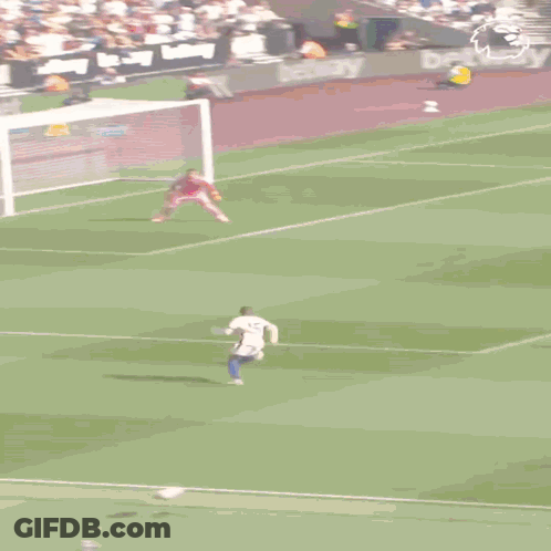 Soccer Player #15 Kicks Ball GIF