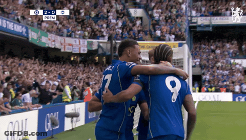 Soccer Player #9 Hugging Another Player GIF