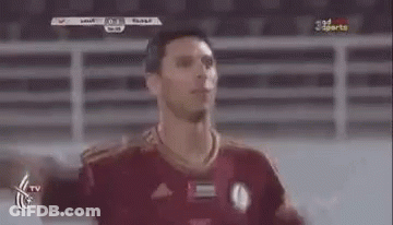 Soccer Player Arms Outstretched On Field GIF
