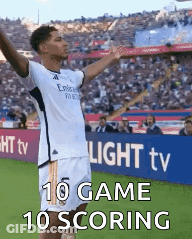 Soccer Player Arms Outstretched Says 10 Game 10 Scoring GIF