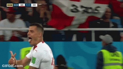 Soccer Player Celebrates Goal In Front Of BBC Banner GIF