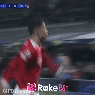 Soccer Player Celebrates Goal With Rakebit Logo GIF