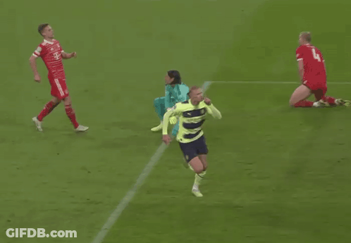 Soccer Player Celebrating Goal In Neon Yellow And Blue GIF