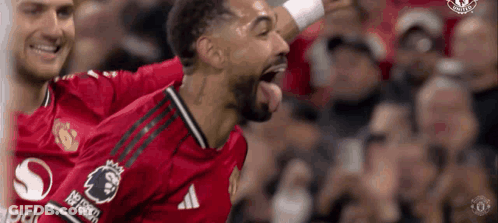 Soccer Player Celebrating Goal In Red Jersey GIF