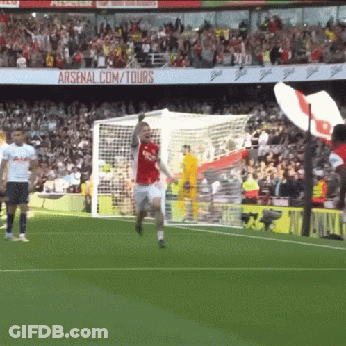 Soccer Player Celebrating Goal With Arsenal.com Tours Background GIF