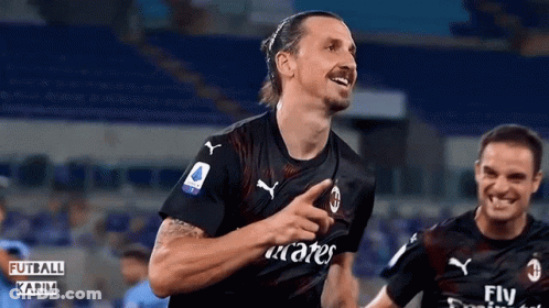 Soccer Player Celebrating In Fly Emirates Jersey GIF