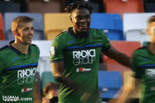 Soccer Player Celebrating In Green Jersey GIF