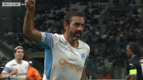 Soccer Player Celebrating In Orange Jersey GIF