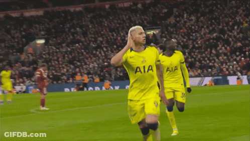 Soccer Player Celebrating In Yellow Jersey GIF