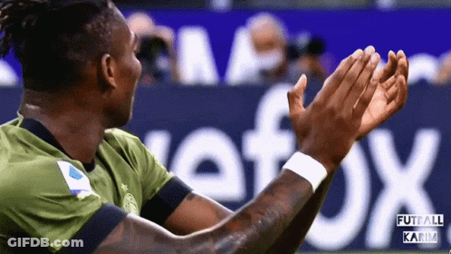 Soccer Player Clapping In Front Of Futball Karim Banner GIF