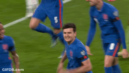 Soccer Player Covering Ears Celebrating Goal GIF