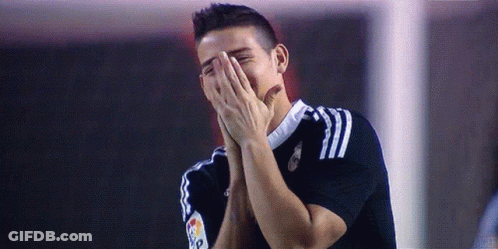 Soccer Player Covering Face And Laughing GIF