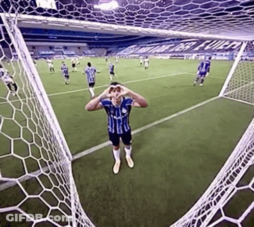Soccer Player Hands Over Eyes In Front Of Goal GIF
