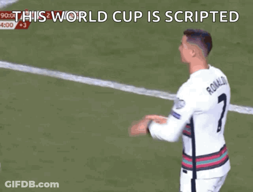 Soccer Player Holding Blue Card Saying This World Cup Is Scripted GIF