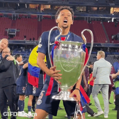 Soccer Player Holding Champions League Trophy GIF