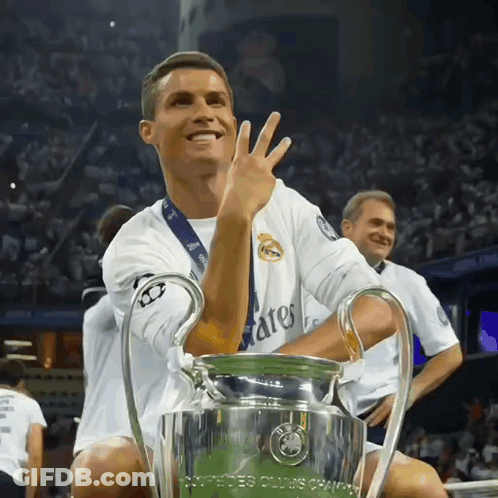 Soccer Player Holding Champions League Trophy GIF