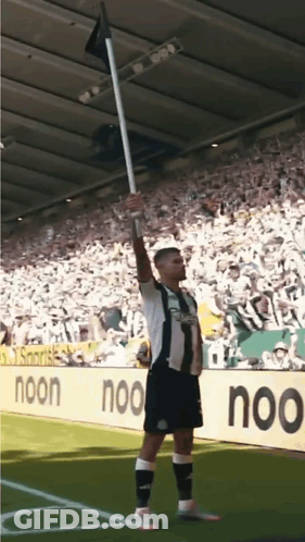 Soccer Player Holding Flag GIF