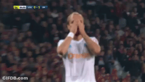 Soccer Player Holding Head In Hands GIF
