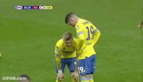 Soccer Player Holding Pants Up GIF