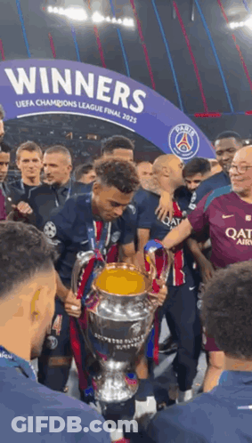 Soccer Player Holding Trophy GIF