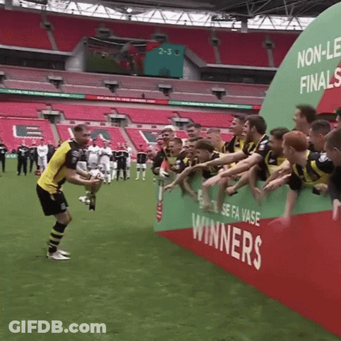 Soccer Player Holding Trophy GIF