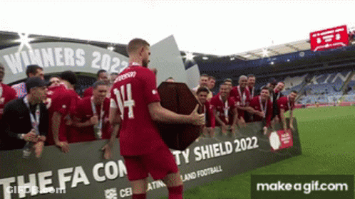 Soccer Player Holding Trophy Number 14 GIF