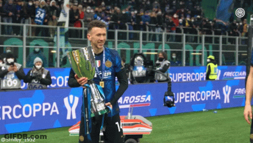 Soccer Player Holding Trophy Supercoppa Banner GIF