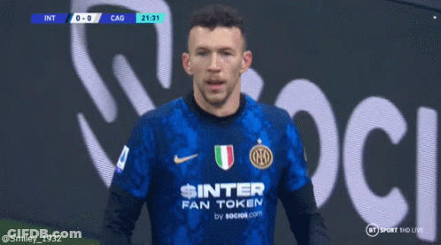 Soccer Player Holding Trophy With IO On Shirt GIF