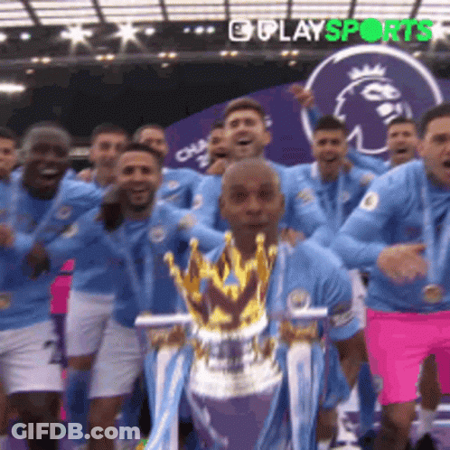 Soccer Player Holding Trophy GIF