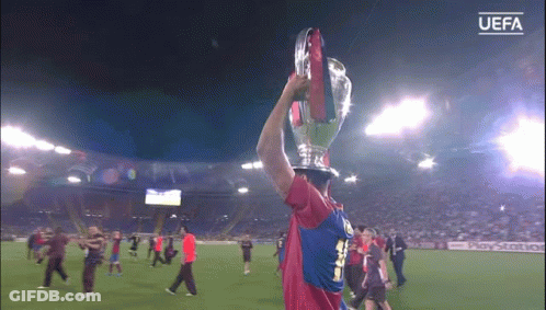 Soccer Player Holding UEFA Trophy GIF