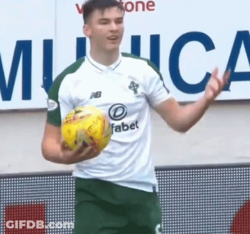 Soccer Player Holding Yellow Ball GIF