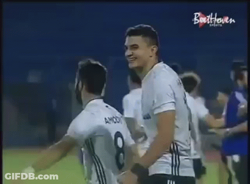 Soccer Player Hugging Another Player GIF
