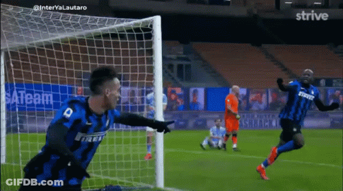 Soccer Player In 44 Jersey Hugging Another GIF