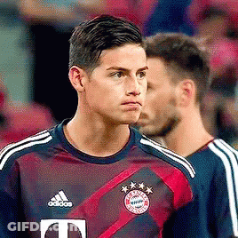 Soccer Player In Adidas Jersey Next To Another Soccer Player GIF