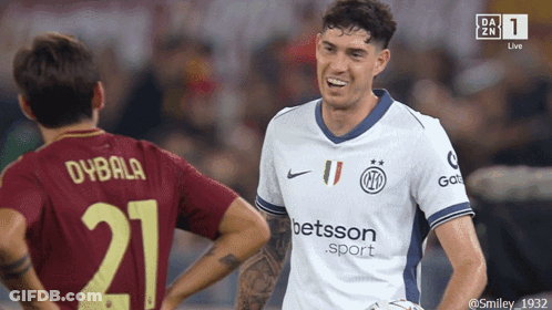 Soccer Player In Betsson Sport Jersey Next To Another Player GIF