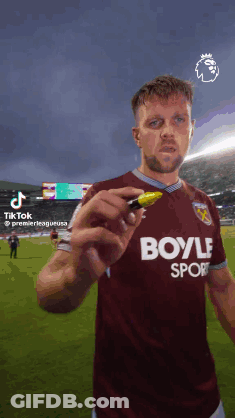 Soccer Player In Betw Jersey Next To Mannequin GIF