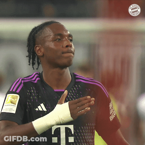 Soccer Player In Black And Purple Shirt GIF