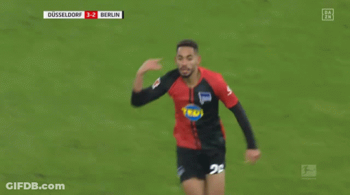 Soccer Player In Black And Red Jersey Running GIF