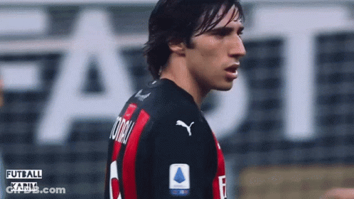 Soccer Player In Black And Red Puma Jersey GIF