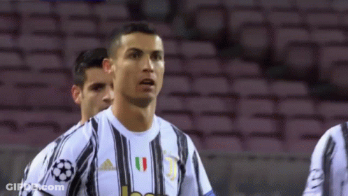 Soccer Player In Black And White Jersey At Stadium GIF