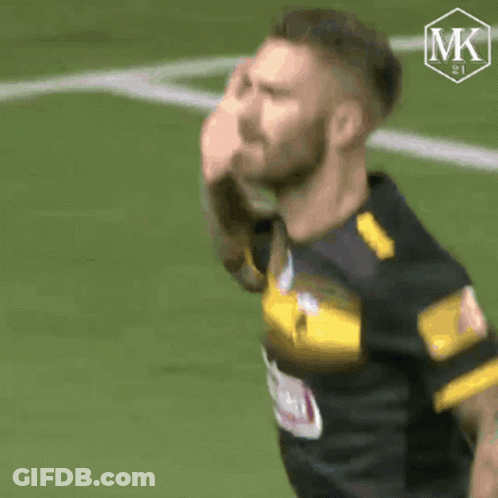 Soccer Player In Black And Yellow Jersey GIF