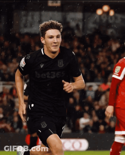 Soccer Player In Black Bet365 Jersey Running GIF